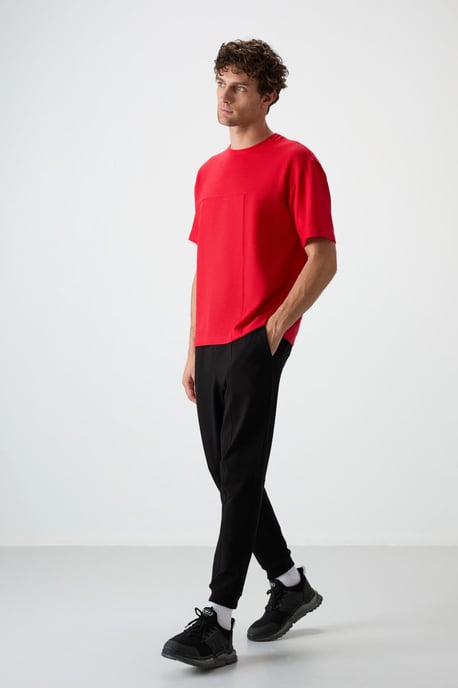 Übergrößen-Jersey-T-Shirt mit Tasche - Image 4