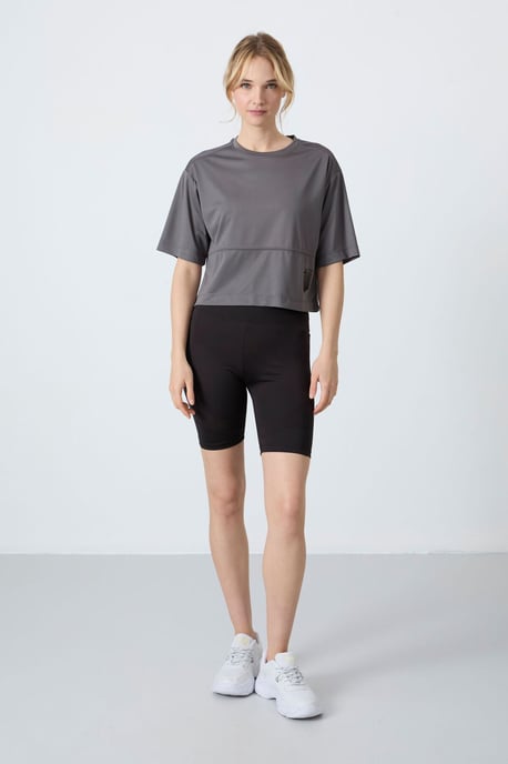 Oversized Polyester Rundhals-T-Shirt mit Tasche - Image 5