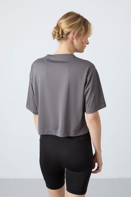 Oversized Polyester Rundhals-T-Shirt mit Tasche - Image 6
