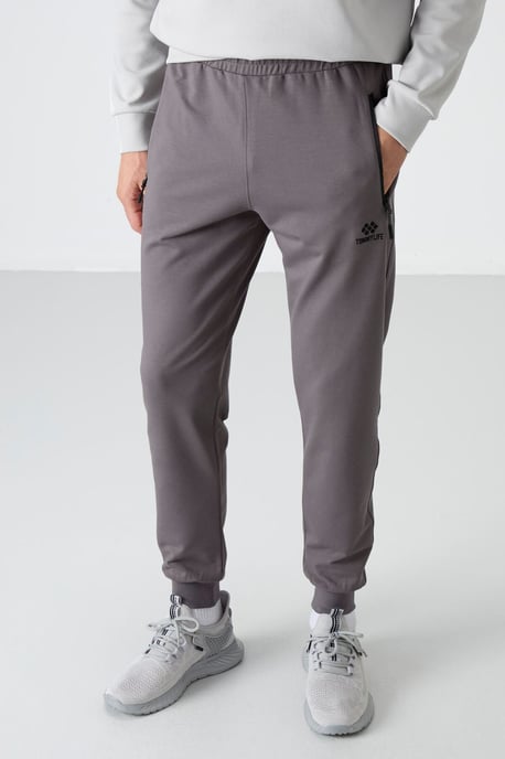 Herren Unifarbene Sweatpants mit Reißverschlusstasche - Image 1