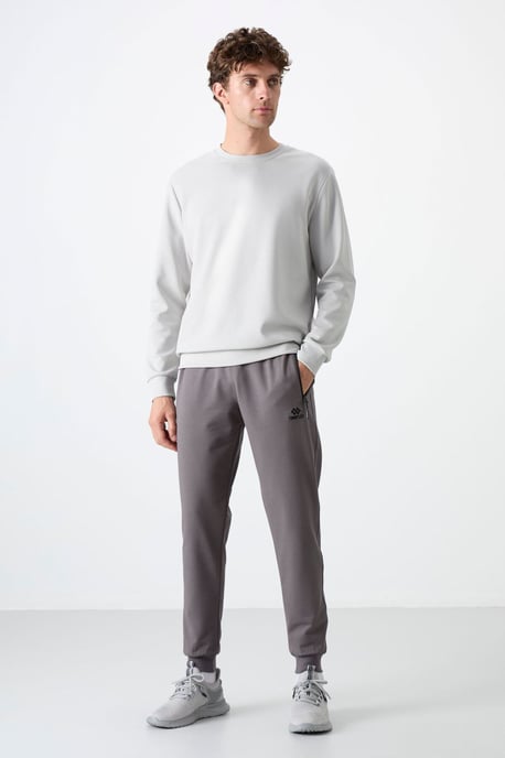 Herren Unifarbene Sweatpants mit Reißverschlusstasche - Image 2