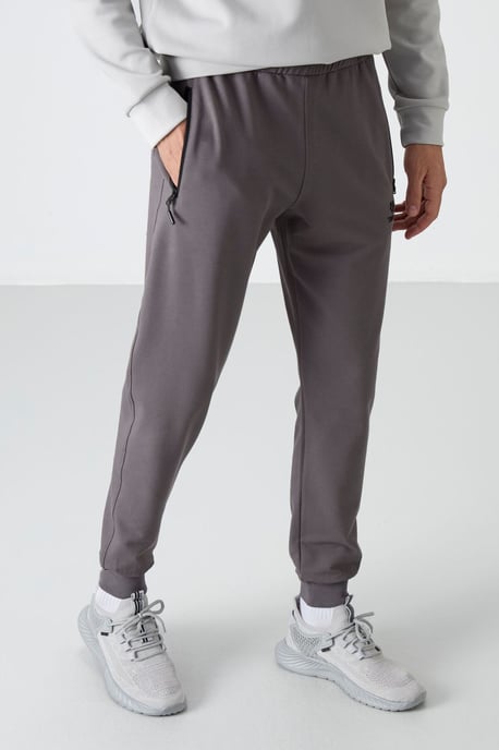 Herren Unifarbene Sweatpants mit Reißverschlusstasche - Image 4