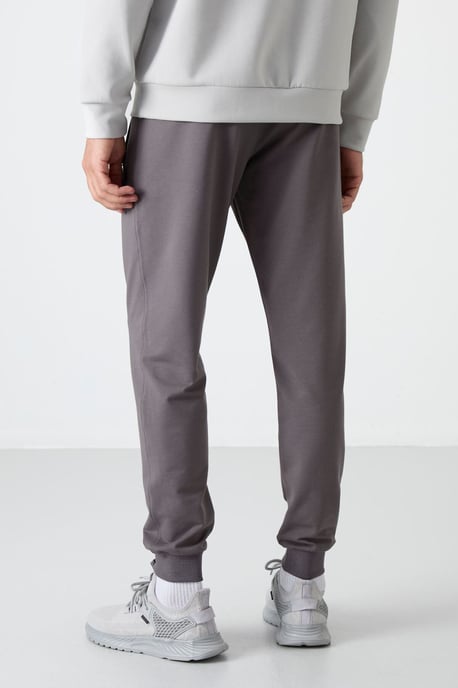 Herren Unifarbene Sweatpants mit Reißverschlusstasche - Image 5