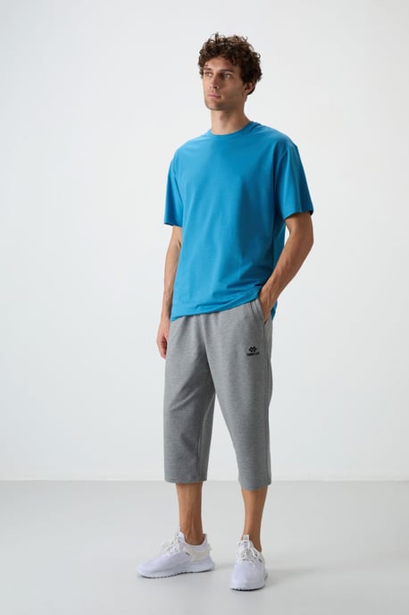 Herren Mid-Waist Weitbeinige Capri-Shorts - Image 1