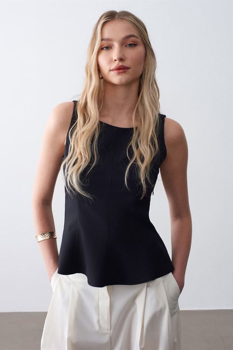Taillierte ärmellose Crepe-Peplum-Bluse - Image 1