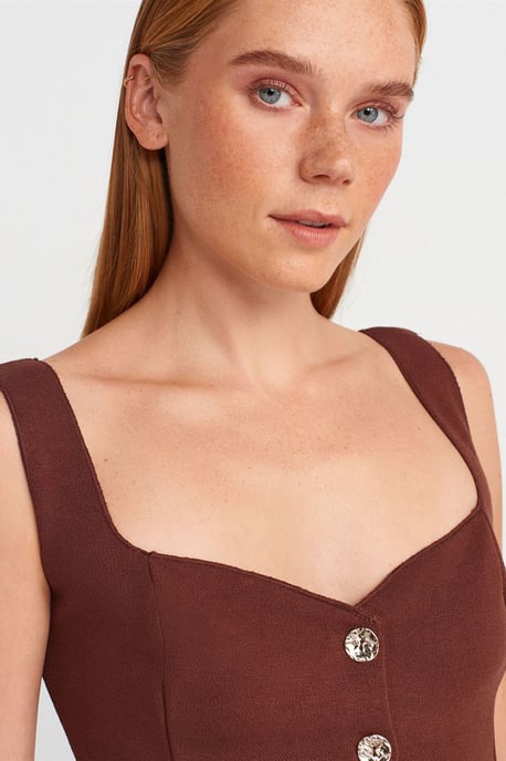 Figurbetonte ärmellose Peplum-Bluse - Image 3
