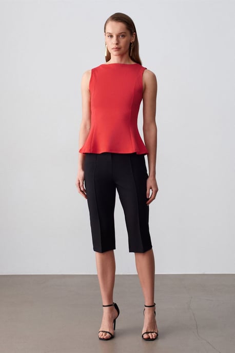 Figur betonte ärmellose Peplum-Bluse - Image 1