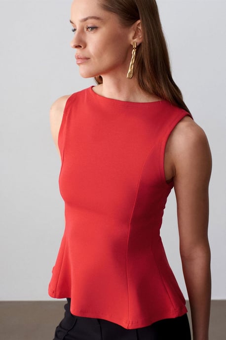Figur betonte ärmellose Peplum-Bluse - Image 4