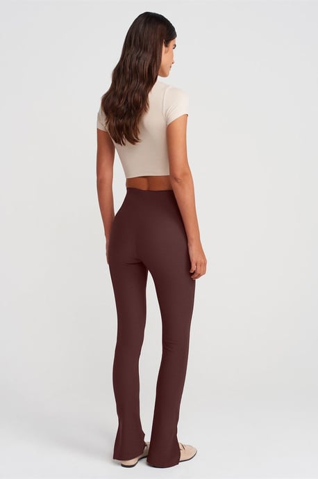 Hochtaillierte Schlagleggings mit Schlitz - Image 2