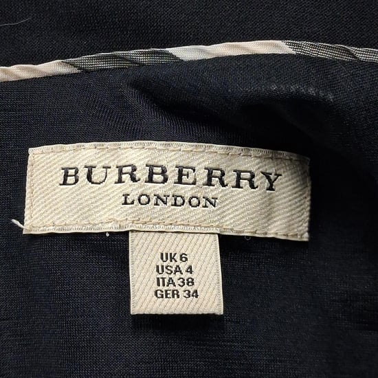 Burberry Midikleid mit V-Ausschnitt und kurzen Ärmeln aus schwarzem Polyester - Image 3