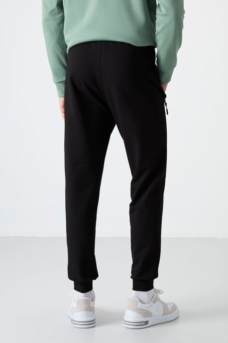 Herren Einfarbige Sweatpants mit Reißverschlusstasche - Image 5