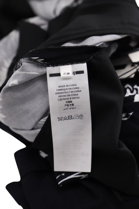 McQ by Alexander McQueen Hose mit Blumenmuster und weitem Bein aus schwarzem Polyester - Image 5