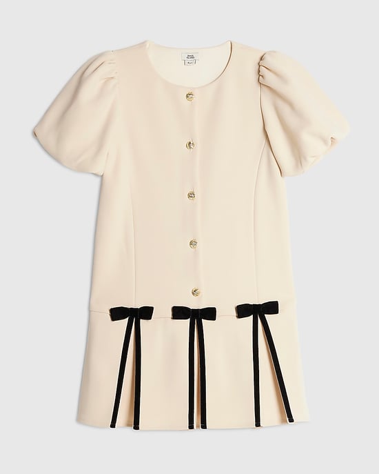 River Island Mädchenkleid Cremefarben Plissierter Schleifensaum Rundhalsausschnitt - Image 1
