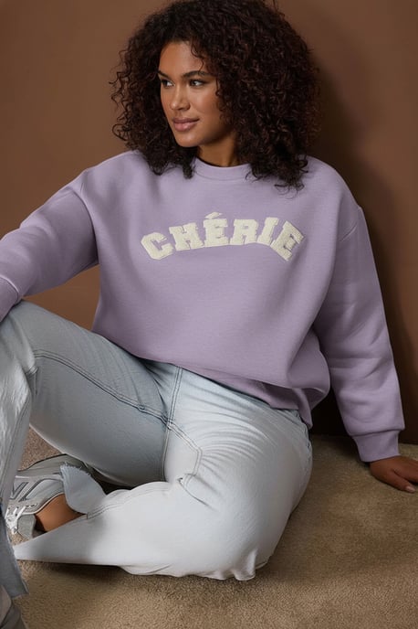 Trendyol Curve Damen Lila Slogan Lang Oversize Große Größen Sweatshirts - Image 1