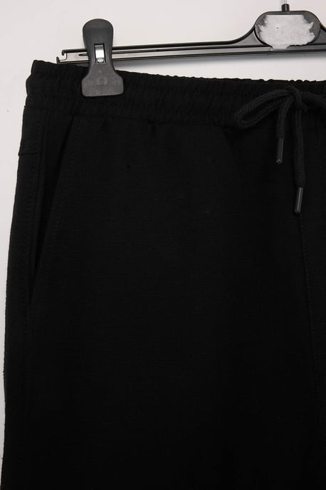 TRENDYOL MAN Herren Schwarz Einfarbig Weites Bein Normale Taille Hosen - Image 4